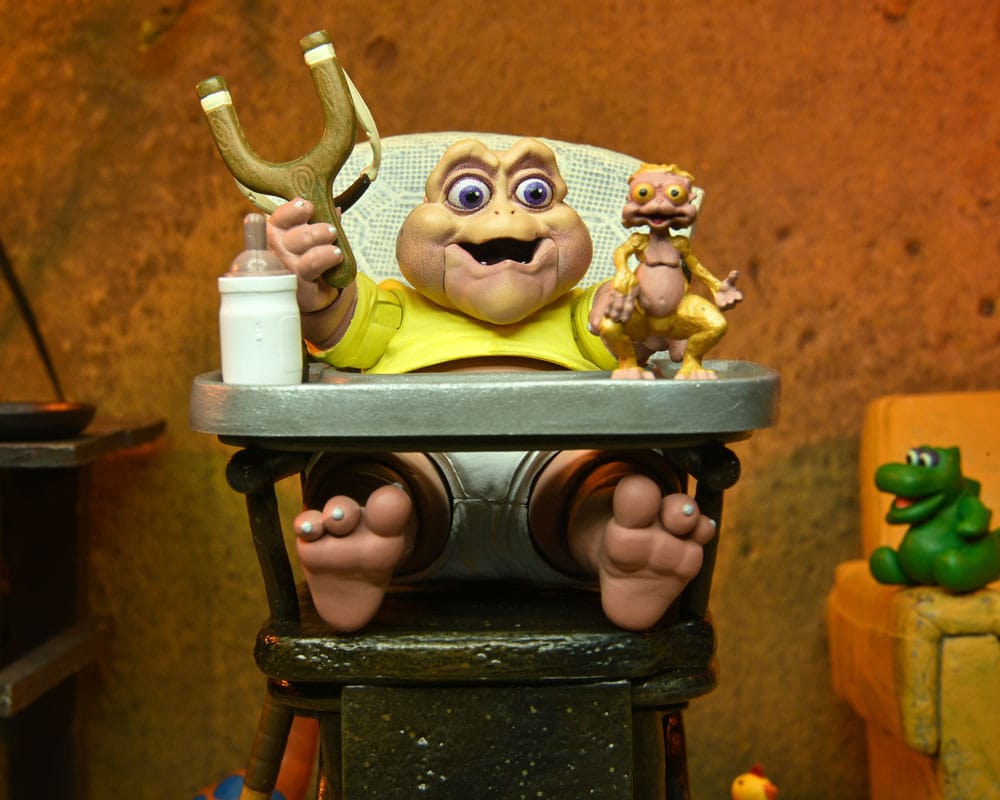Figura Baby Sinclair NECA con cabezas intercambiables, juguetes y trona Dinosaurs.