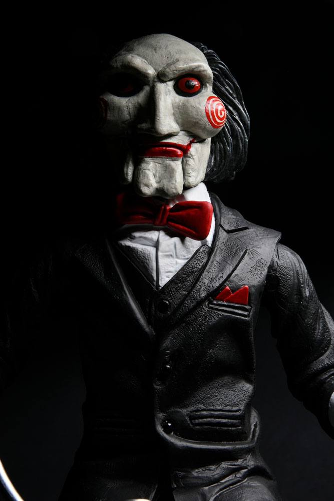 Billy de Saw con triciclo figura NECA