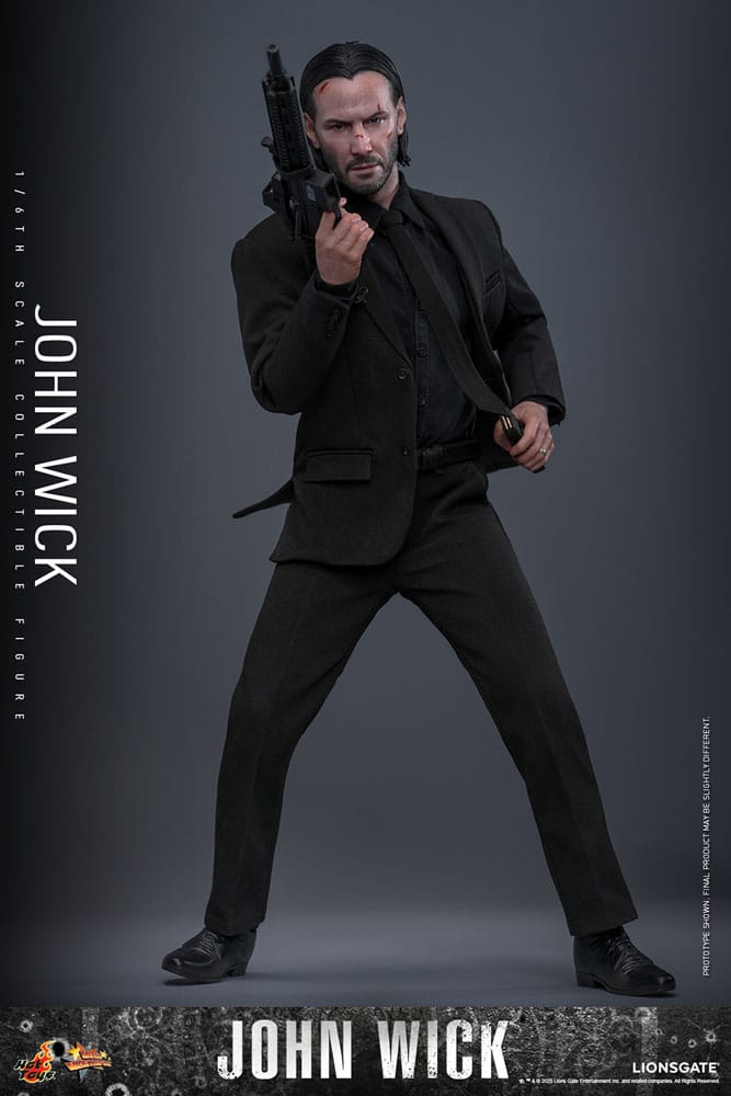 Figura JOHN WICK Hot Toys con pistolas y traje negro en pose de acción.