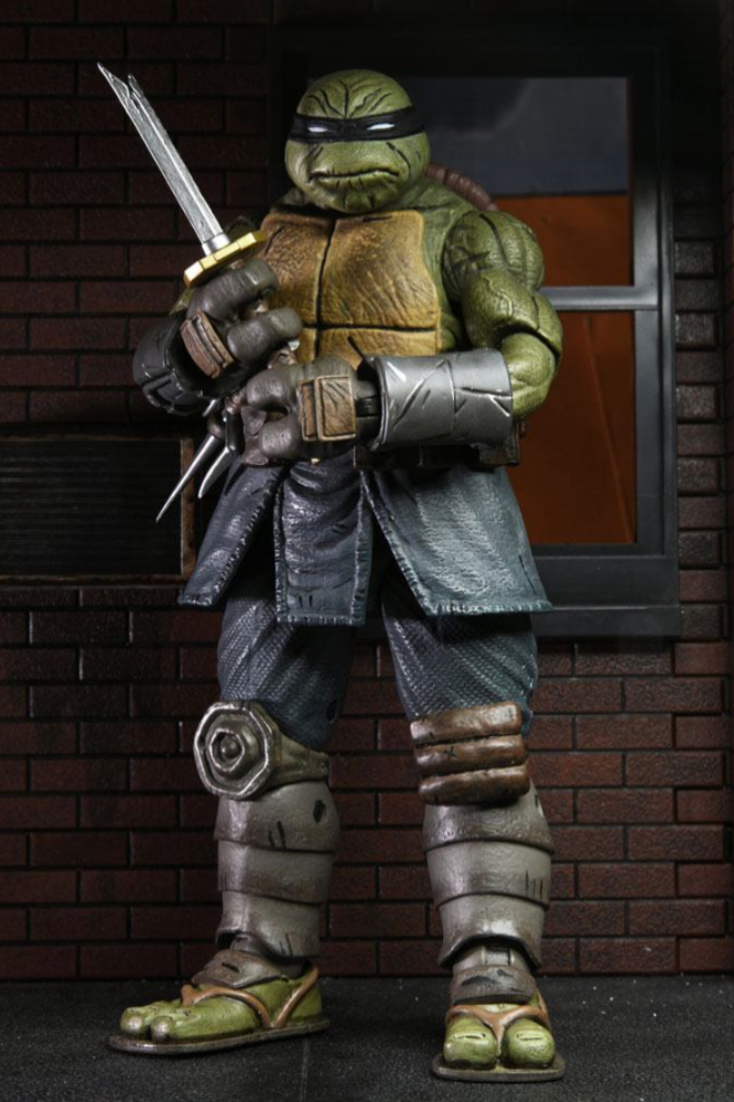 Figura TMNT The Last Ronin Unarmored NECA 18 cm con accesorios.