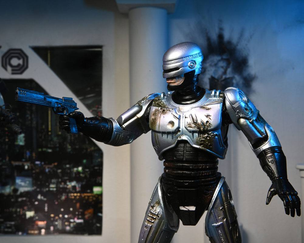ROBOCOP ULTIMATE BATTLE DAMAGED WITH CHAIR – FIGURA 18 CM (NECA – ROBOCOP)