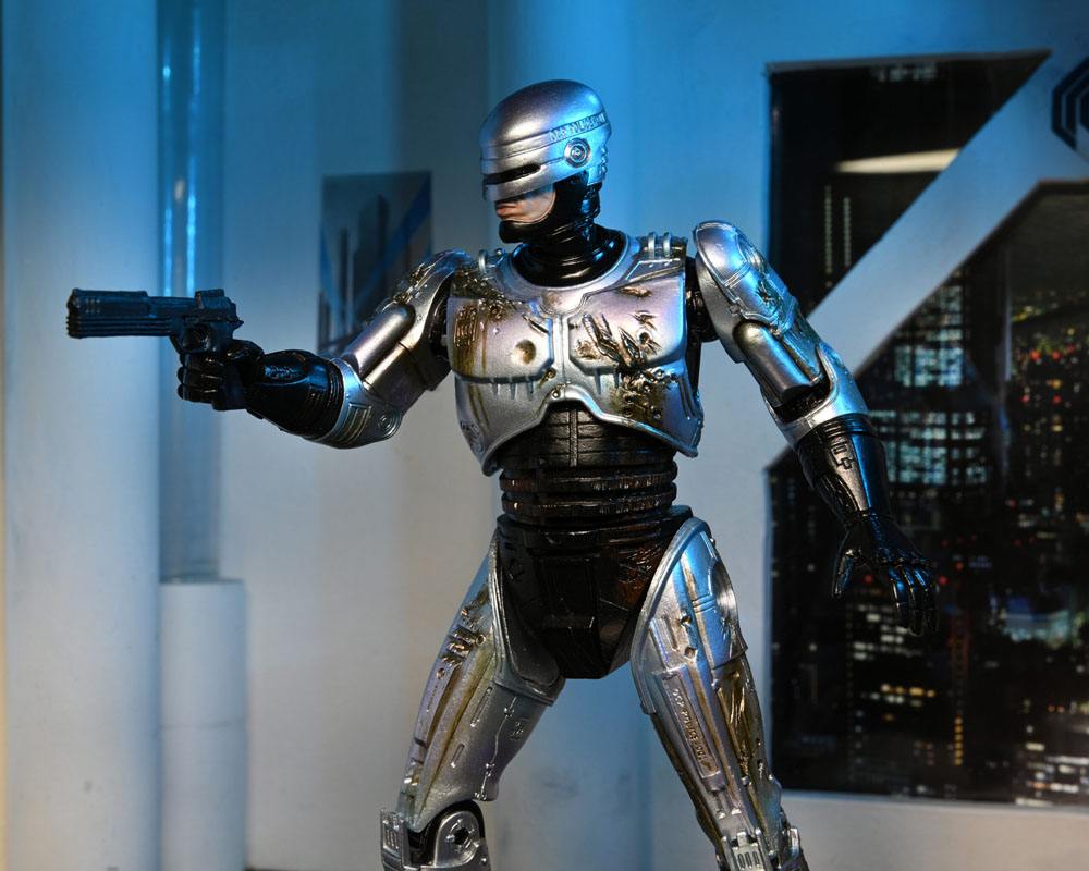 ROBOCOP ULTIMATE BATTLE DAMAGED WITH CHAIR – FIGURA 18 CM (NECA – ROBOCOP)