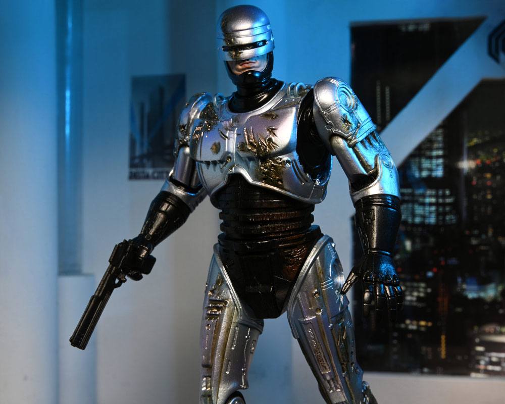 ROBOCOP ULTIMATE BATTLE DAMAGED WITH CHAIR – FIGURA 18 CM (NECA – ROBOCOP)