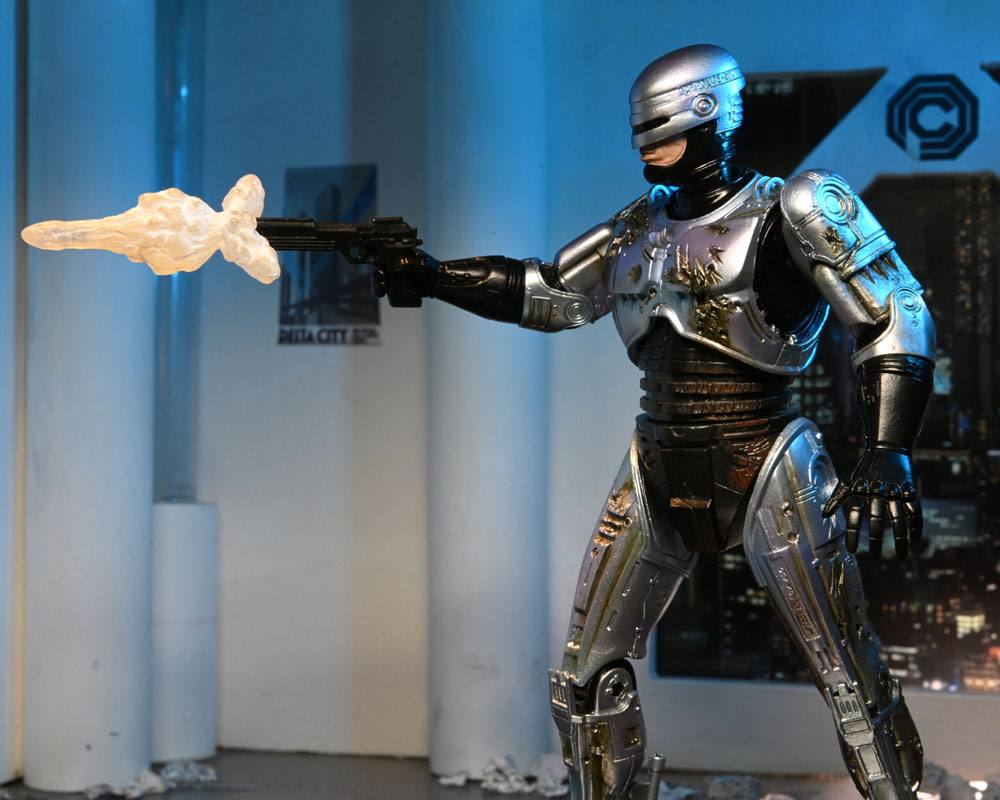 ROBOCOP ULTIMATE BATTLE DAMAGED WITH CHAIR – FIGURA 18 CM (NECA – ROBOCOP)