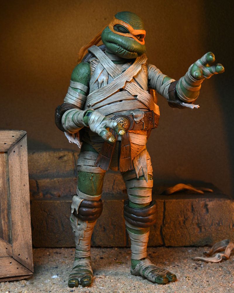 MICHELANGELO AS THE MUMMY – UNIVERSAL MONSTERS x TEENAGE MUTANT NINJA TURTLES ULTIMATE FIGURA 18 CM (NECA – TMNT)