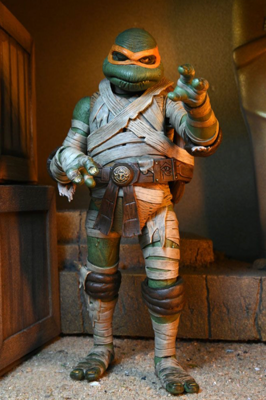 MICHELANGELO AS THE MUMMY – UNIVERSAL MONSTERS x TEENAGE MUTANT NINJA TURTLES ULTIMATE FIGURA 18 CM (NECA – TMNT)