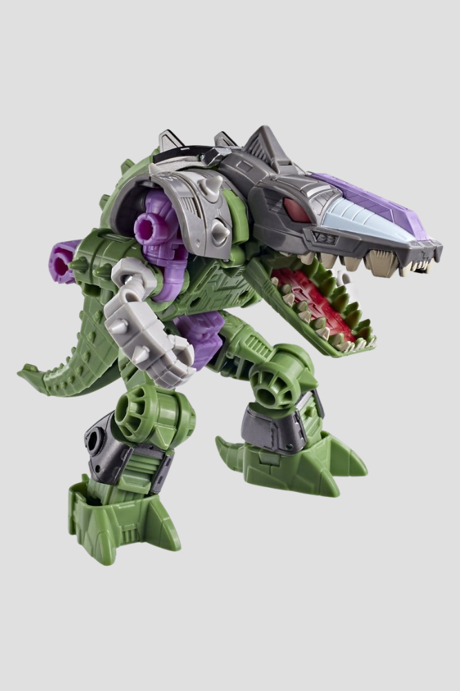 Figura Allicon Transformers Studio Series Deluxe Class de Hasbro de 14 cm, basada en Transformers: La película de 1986, transformable de robot a cocodrilo en 14 pasos, con lanza y aleta dorsal desmontables.
