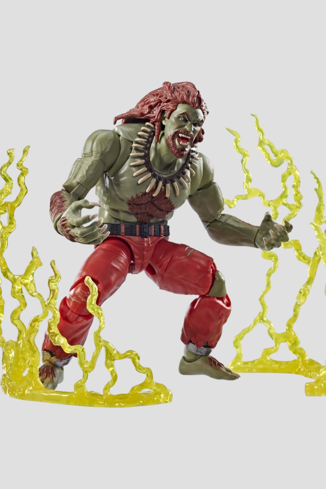 Figura articulada de Blanka de Street Fighter de Hasbro de 15 cm, con piel verde, cabello rojizo, pantalones rojos, cabeza intercambiable y accesorios de efectos eléctricos.