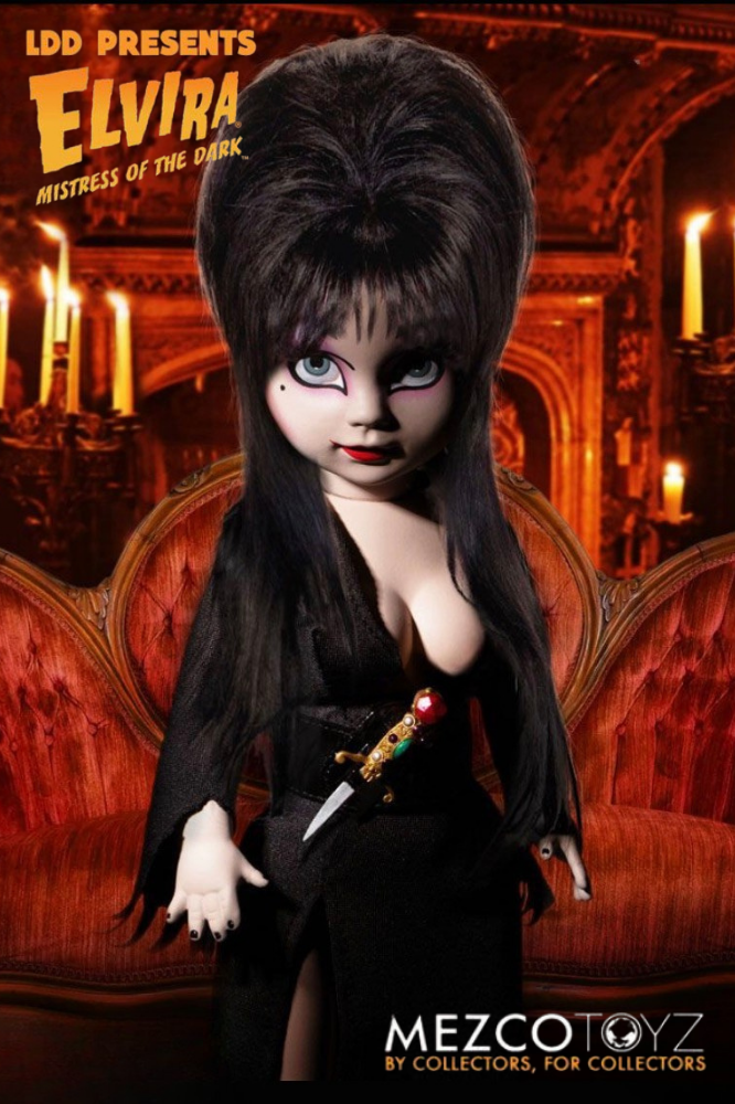 Muñeca Elvira Mistress of the Dark Living Dead Dolls Presents de Mezco Toyz de aproximadamente 25 cm, con vestido negro de tela y su característico cabello negro.