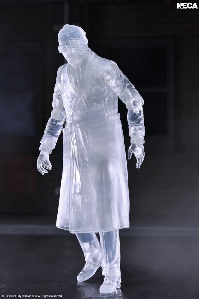 Figura translúcida de Invisible Man de Universal Monsters fabricada por NECA, articulada y de aproximadamente 18 cm de altura.