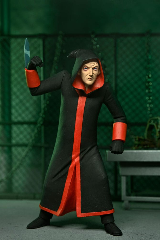 Figura de Jigsaw Killer de Saw perteneciente al set Toony Terrors de NECA con Billy y su característico triciclo.