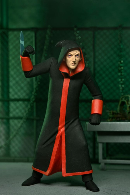 Figura de Jigsaw Killer de Saw perteneciente al set Toony Terrors de NECA con Billy y su característico triciclo.