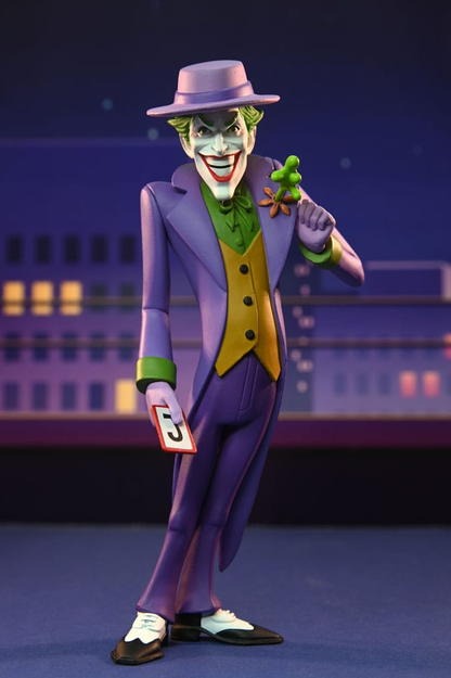 Figura Toony de The Joker de DC Comics fabricada por NECA, con traje morado, sombrero y estética inspirada en los cómics clásicos.