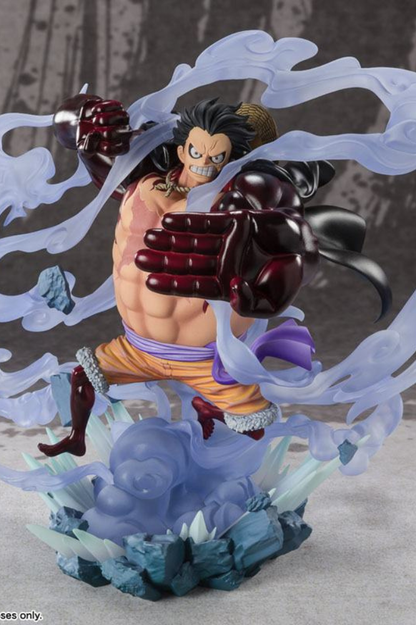 Estatua FiguartsZERO Extra Battle de Monkey D. Luffy Gear 4 Battle of Monsters on Onigashima de One Piece, fabricada por Tamashii Nations en PVC con una altura aproximada de 21 cm.