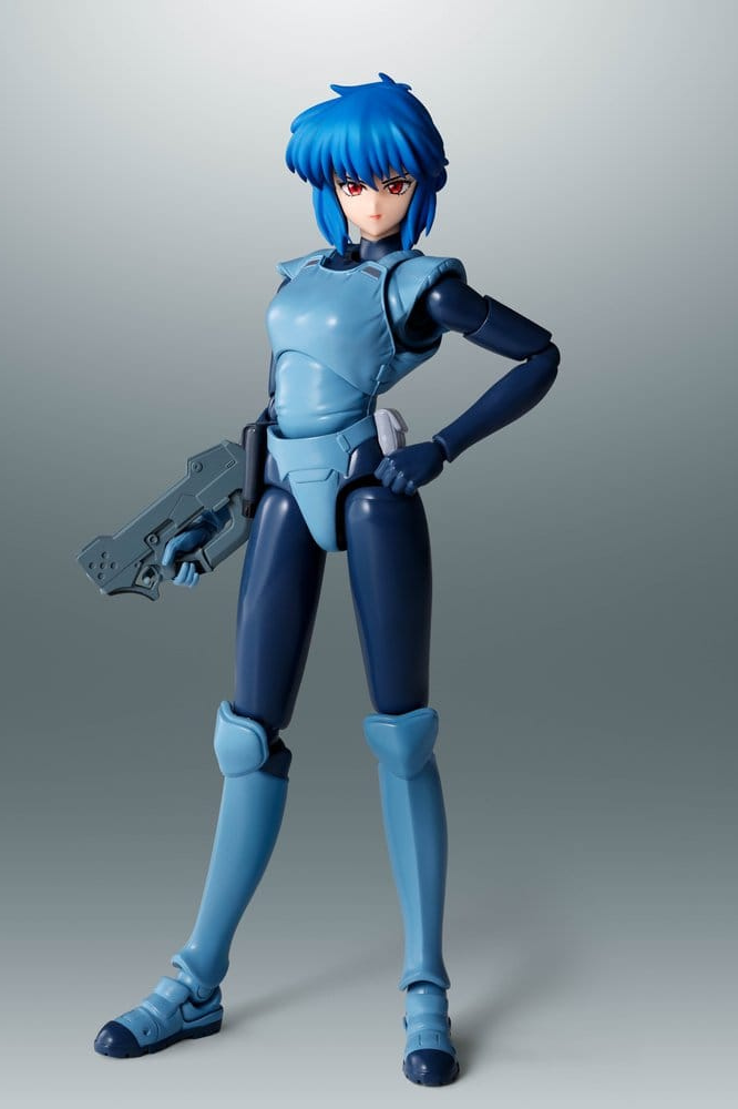 Figura S.H.Figuarts de Motoko Kusanagi basada en Ghost in the Shell, fabricada por Tamashii Nations, de 14 cm de altura aproximada con rostros, manos, armas Seburo y accesorios intercambiables.