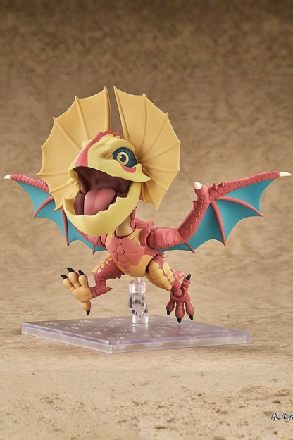 Figura Nendoroid de Yian Kut-Ku de Monster Hunter, fabricada por Good Smile Company, de 9 cm, con cuerpo rojizo, grandes orejas amarillas, alas azuladas y accesorios intercambiables.