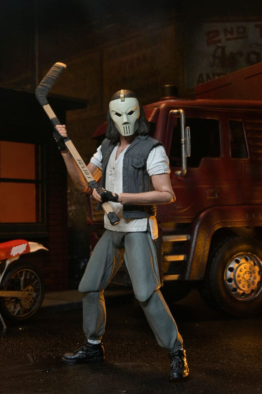 Casey Jones versión Deluxe con bate de hockey frente a camión rojo – figura articulada NECA 18 cm TMNT 1990