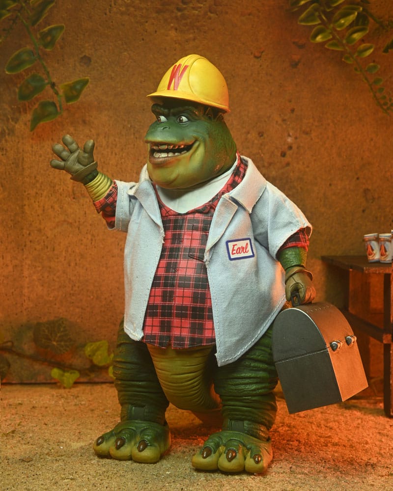 Earl Sinclair con expresión sonriente y postura de trabajo, figura articulada 18 cm.