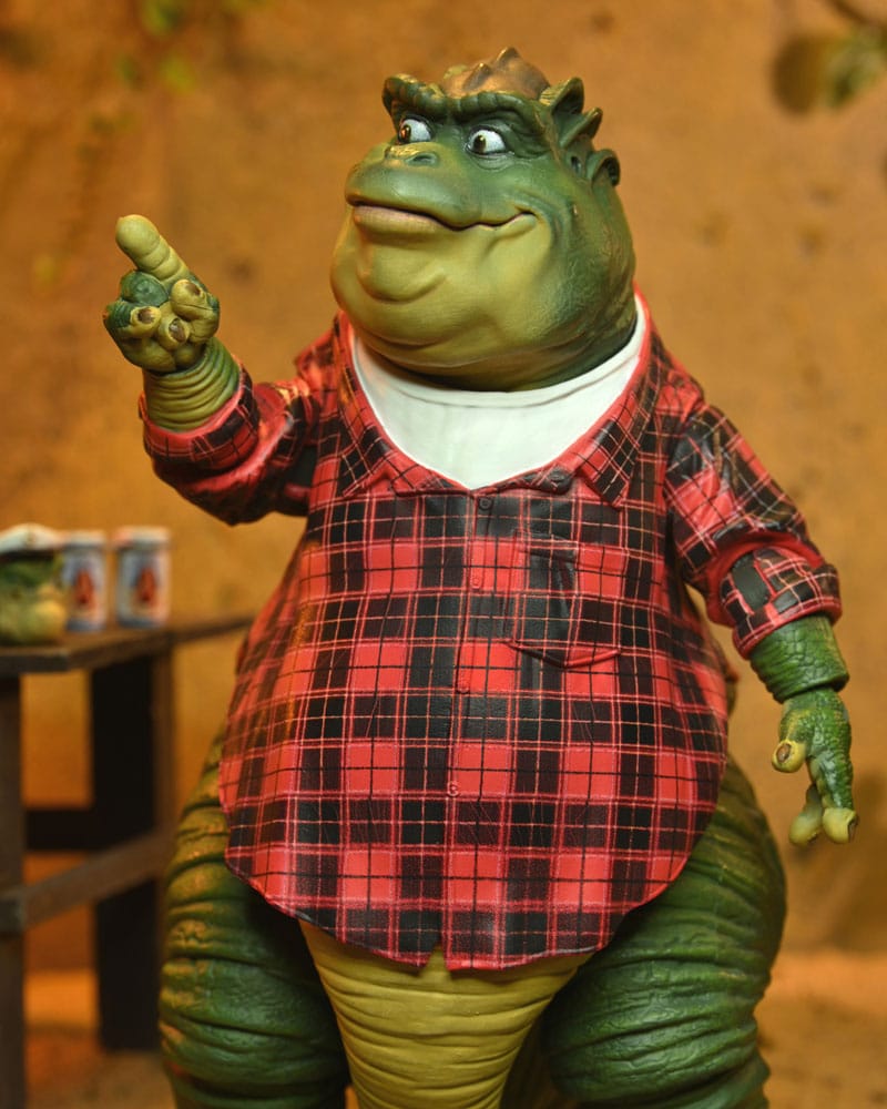 Figura articulada Earl Sinclair con camisa de cuadros y múltiples accesorios NECA.