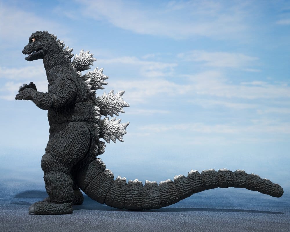Figura Godzilla 1975 S.H.MonsterArts vista lateral con cola larga y textura de escamas