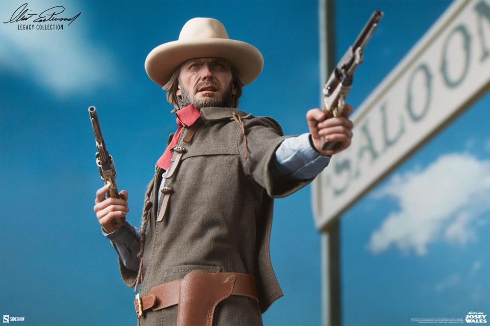 Figura de Josey Wales apuntando con ambas pistolas en fondo desértico.