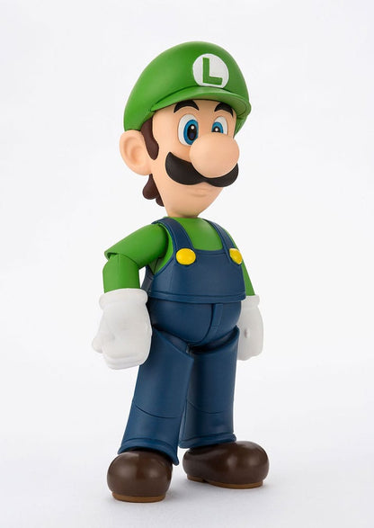Accesorios incluidos en la figura de Luigi: caparazón rojo, bloque y base personalizada.