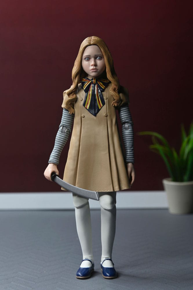 Detalle de la figura Megan en pose con expresión aterradora