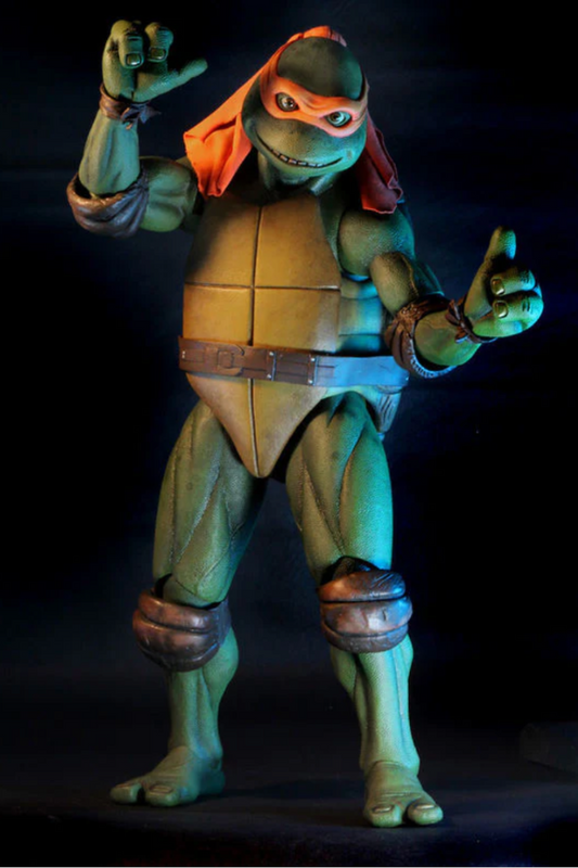 Figura Michelangelo Tortugas Ninja de NECA a escala 1/4 con nunchucks – vista frontal.