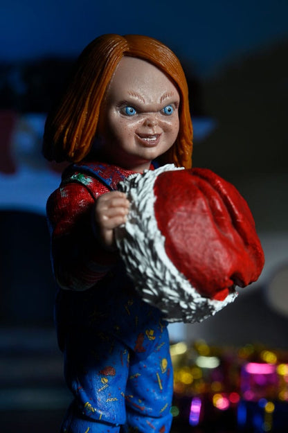 Figura articulada Chucky con pijama navideño – edición especial Ultimate NECA.