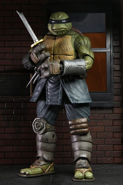 Figura TMNT The Last Ronin Unarmored NECA 18 cm con accesorios.