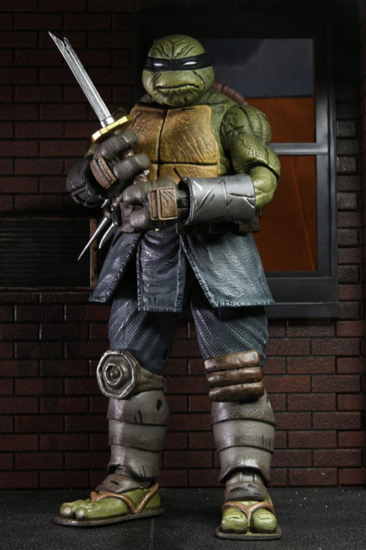 Figura TMNT The Last Ronin Unarmored NECA 18 cm con accesorios.