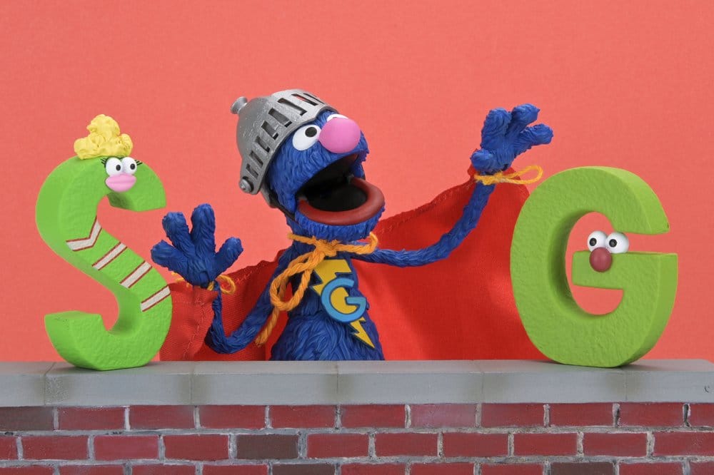 SUPER GROVER BARRIO SÉSAMO  – FIGURA ULTIMATE 18 CM – NECA SESAME STREET