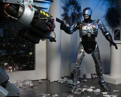 ROBOCOP ULTIMATE BATTLE DAMAGED WITH CHAIR – FIGURA 18 CM (NECA – ROBOCOP)