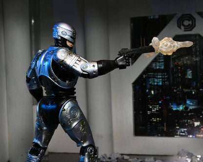 ROBOCOP ULTIMATE BATTLE DAMAGED WITH CHAIR – FIGURA 18 CM (NECA – ROBOCOP)