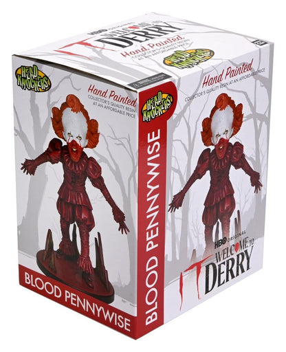 IT: WELCOME TO DERRY – HEAD KNOCKER BLOOD PENNYWISE 19 CM (NECA)