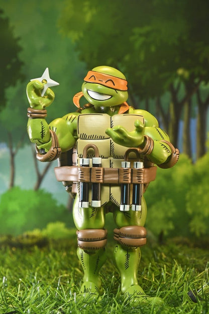 Figura Michelangelo NECA Tortugas Ninja con nunchakus detalle frontal