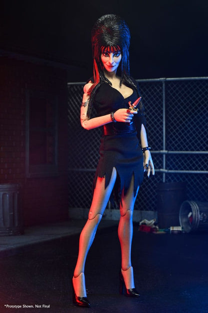 ELVIRA (CLOTHED COMMANDO) – ELVIRA, REINA DE LAS TINIEBLAS 20 CM NECA