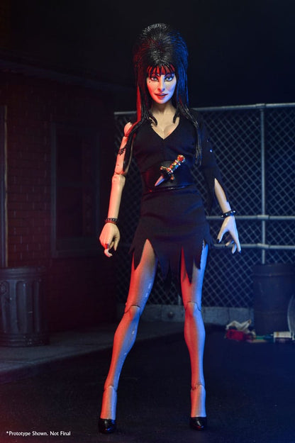 ELVIRA (CLOTHED COMMANDO) – ELVIRA, REINA DE LAS TINIEBLAS 20 CM NECA