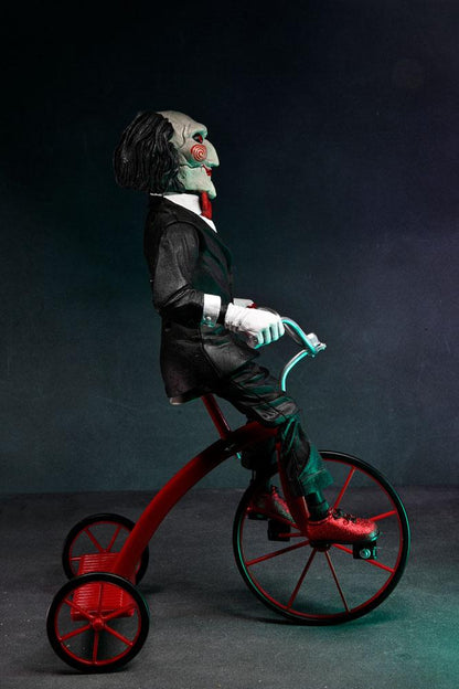 BILLY WITH TRICYCLE – SAW FIGURE WITH SOUND 30 CM (NECA – SAW)
